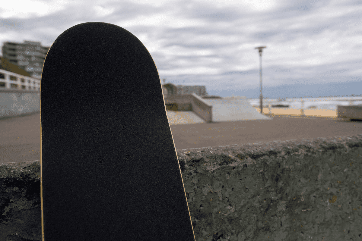 A Skateboard Leaning Against A Wall